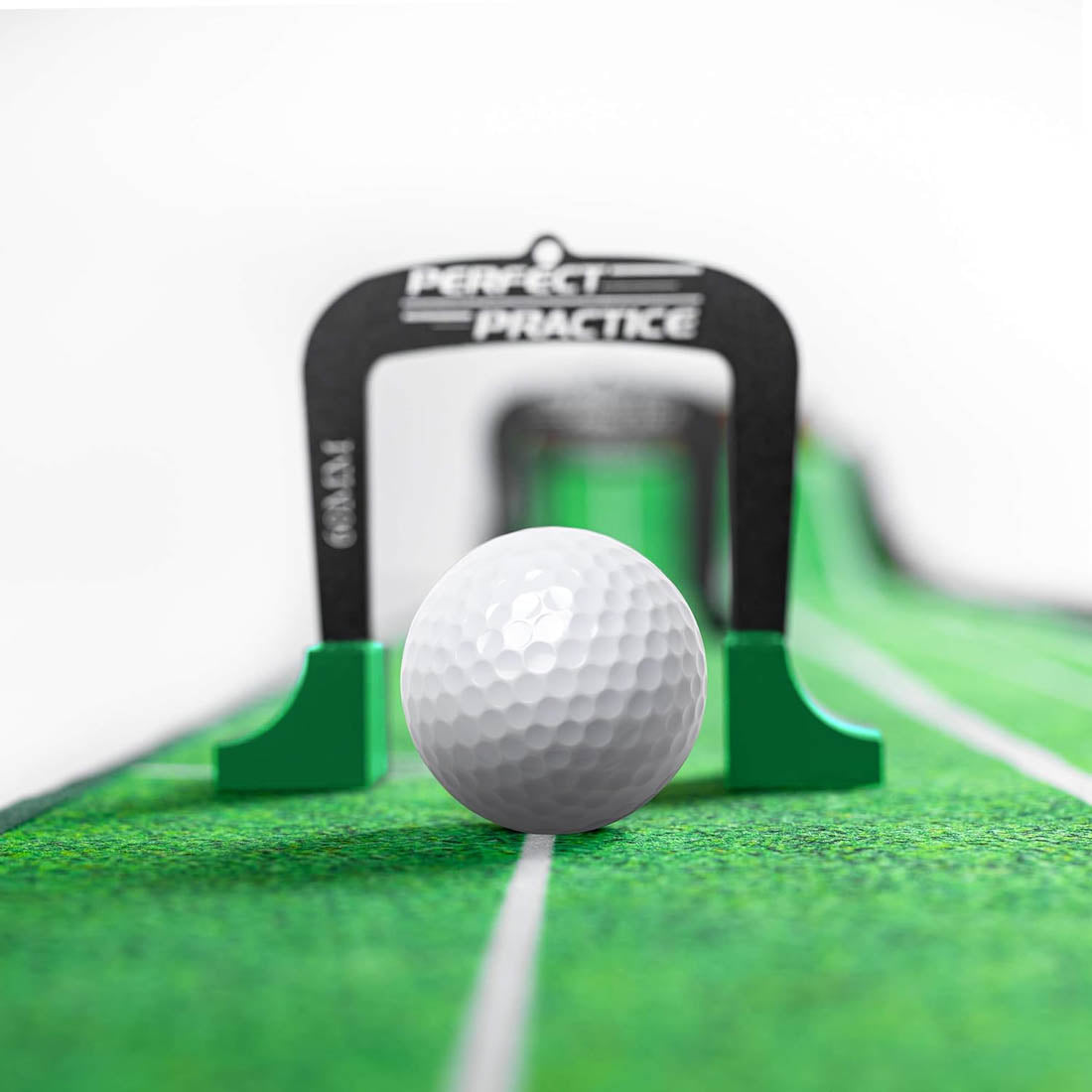 A golf ball in a Perfect Practice putting gate